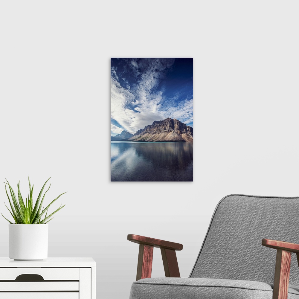 A modern room featuring Crowfoot mountain and blue skies near Bow Lake in Banff National Park, Alberta, Canada.