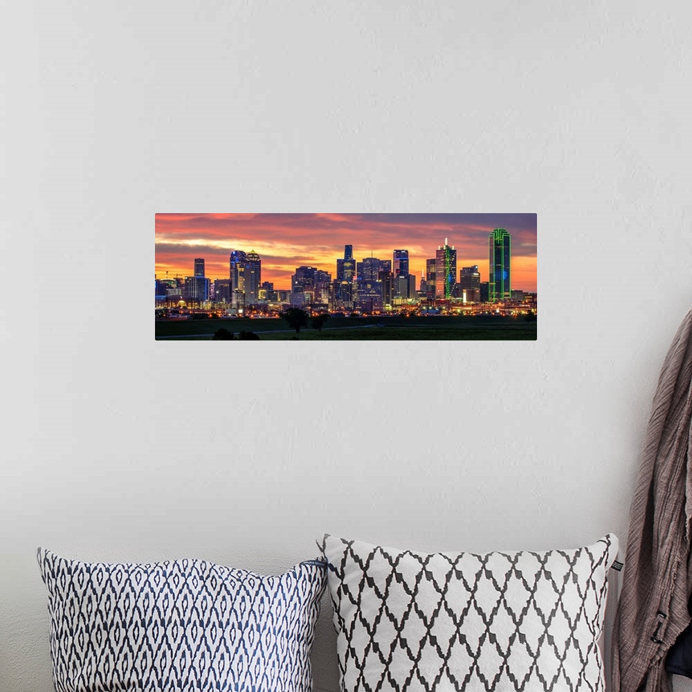 A bohemian room featuring A horizontal image of the Dallas, Texas city skyline with a brilliant sunset.