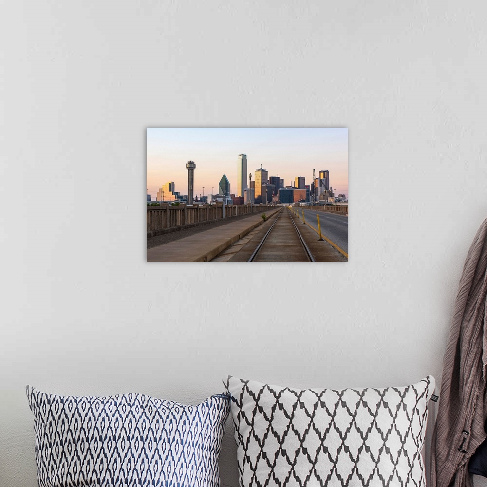 A bohemian room featuring The city of Dallas, Texas at sunset.
