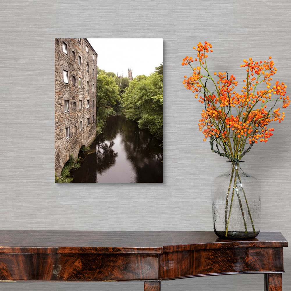 A traditional room featuring Photograph of the picturesque area in Dean Village on the Water of Leith in Edinburgh, Scotland, UK
