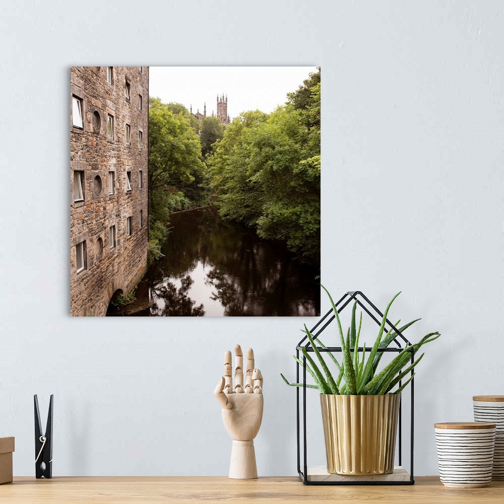 A bohemian room featuring Square photograph of the picturesque area in Dean Village on the Water of Leith in Edinburgh, Sco...