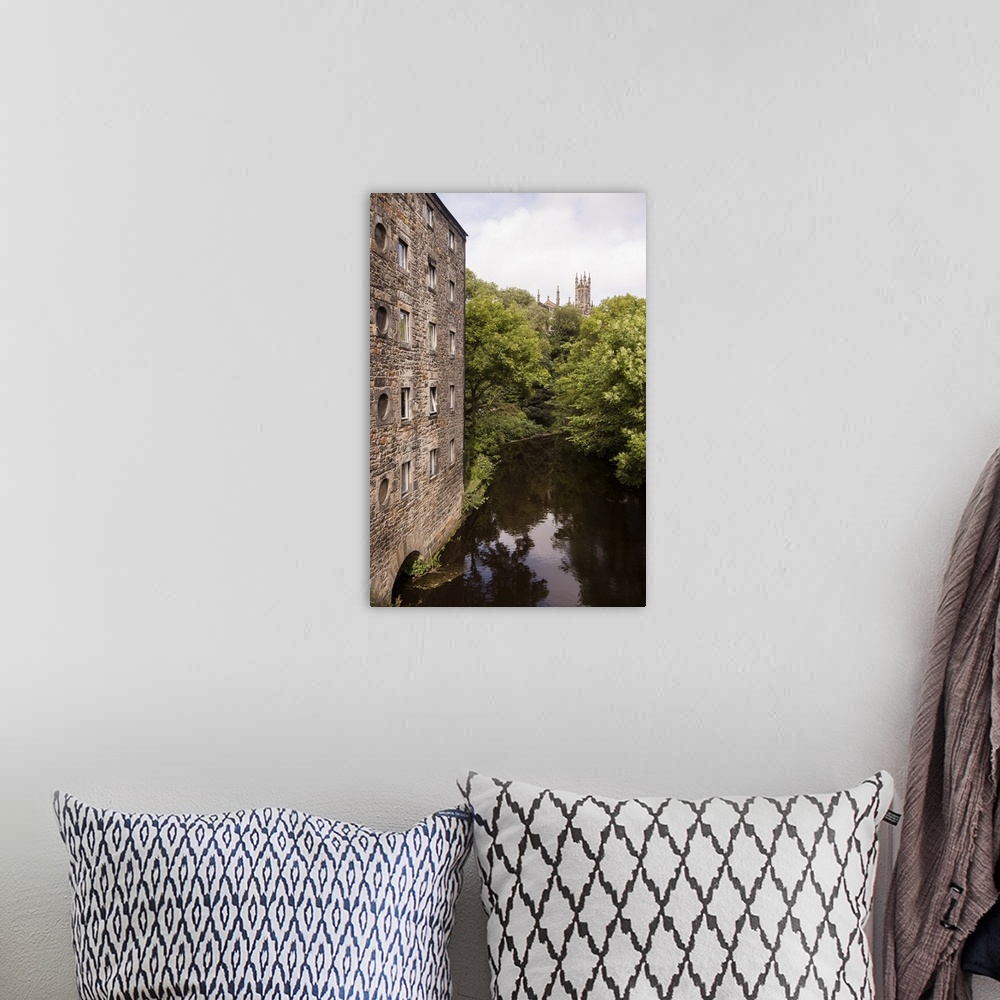 A bohemian room featuring Photograph of the picturesque area in Dean Village on the Water of Leith in Edinburgh, Scotland, UK.