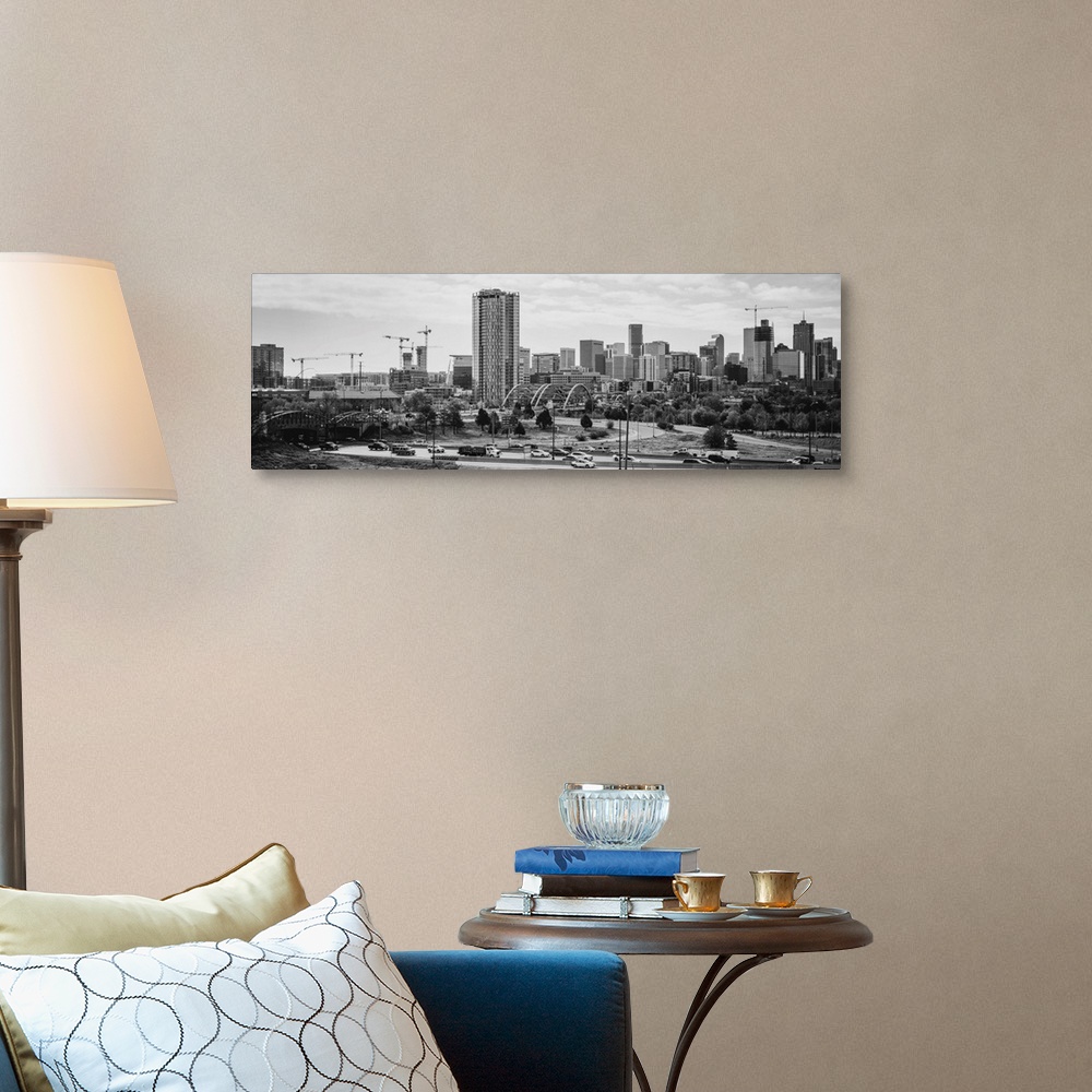 A traditional room featuring Photograph of the Denver, Colorado skyline with cloudy skies above.