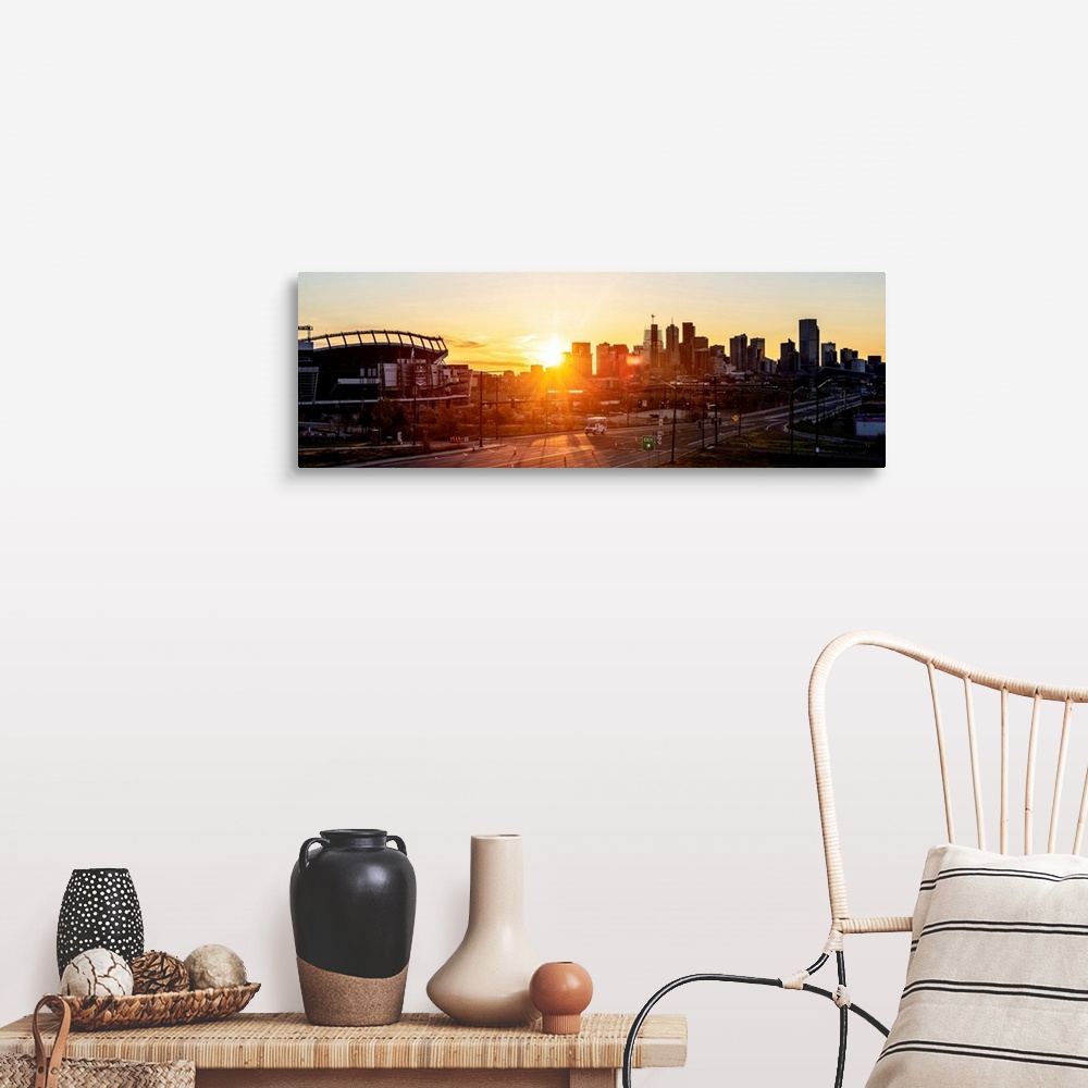 A farmhouse room featuring Panoramic photo of a Denver skyline against a breathtaking sunrise.