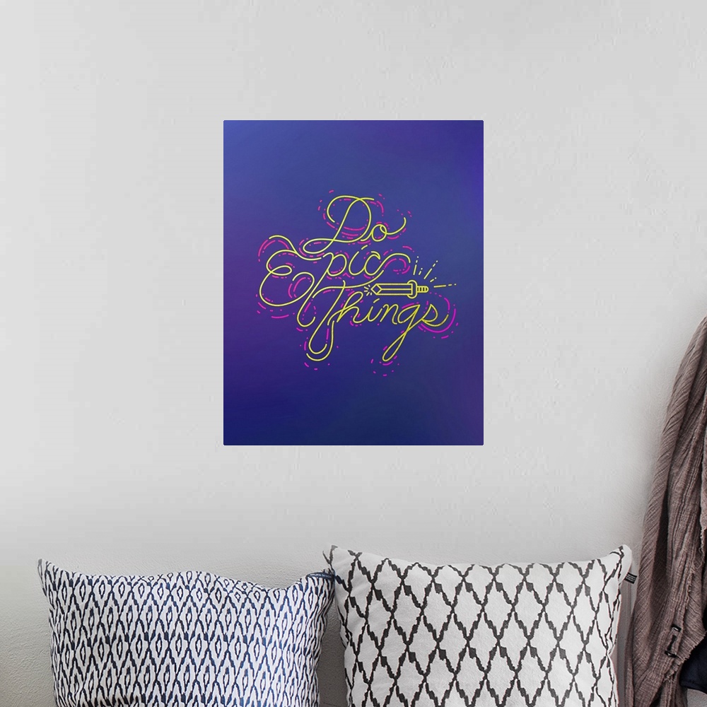 A bohemian room featuring Typography poster in vivid yellow script text with a sword motif on deep blue.