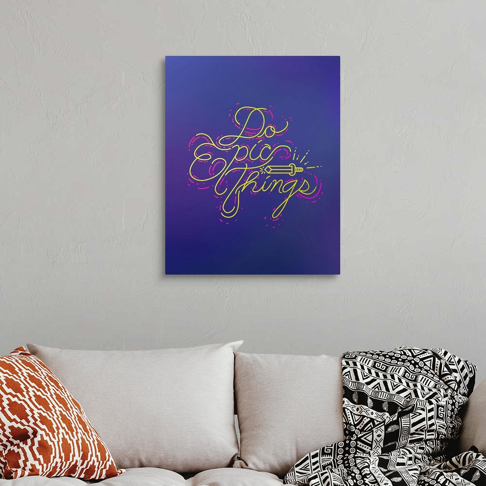 A bohemian room featuring Typography poster in vivid yellow script text with a sword motif on deep blue.
