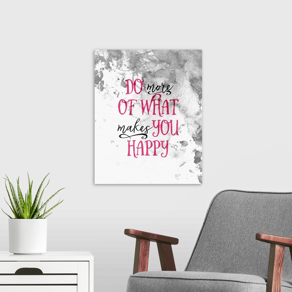 A modern room featuring "Do more of what makes you happy" in black and pink script over a grey watercolor background.