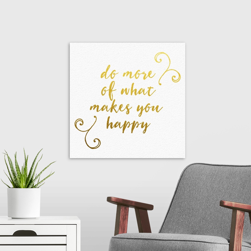 A modern room featuring "Do more of what makes you happy" handwritten in gold with small flourishes.