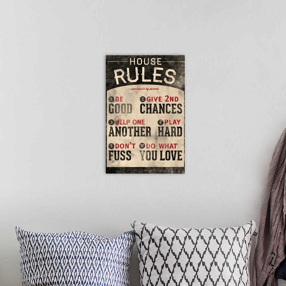 A bohemian room featuring An inspirational poster titled "House Rules". There is a grunge faded look to the print.