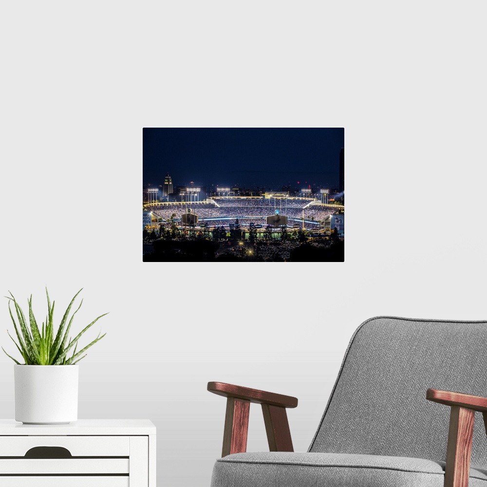 A modern room featuring Photograph of Dodger Stadium lit up on a game night.