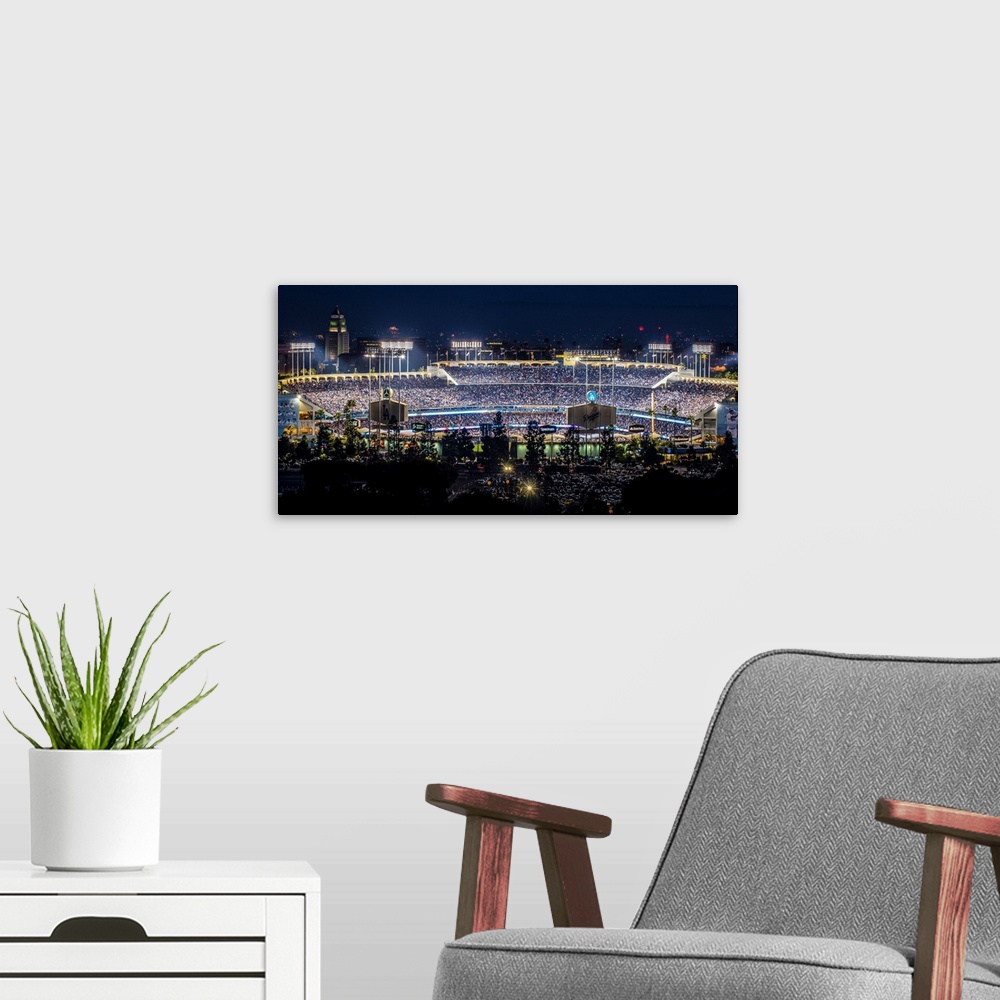 A modern room featuring Panoramic photograph of Dodger Stadium lit up on a game night.