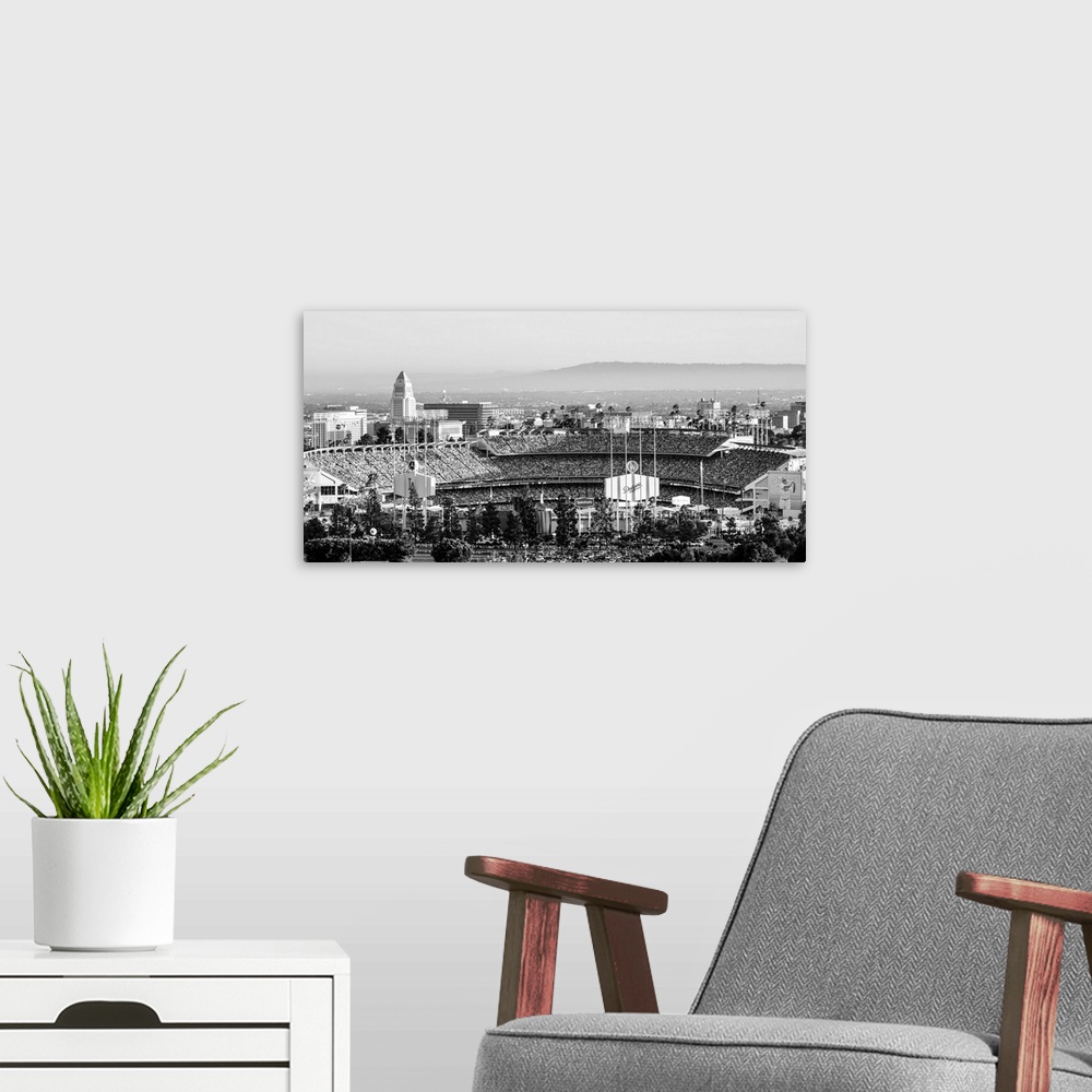 A modern room featuring Panoramic photograph of Dodger Stadium lit up on a game night.