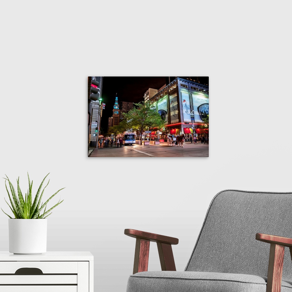 A modern room featuring Photo of downtown Denver with view of the Historic Daniels and Fisher Tower.