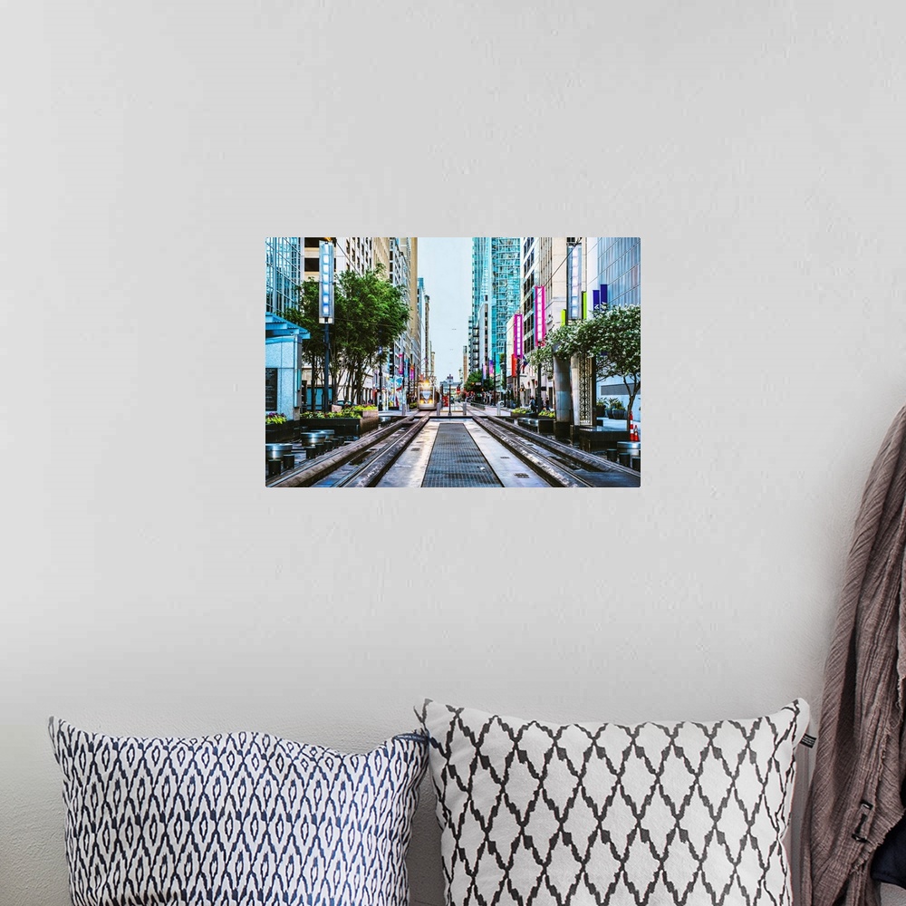 A bohemian room featuring Downtown photograph of Houston TX with the METRORail coming down the center.