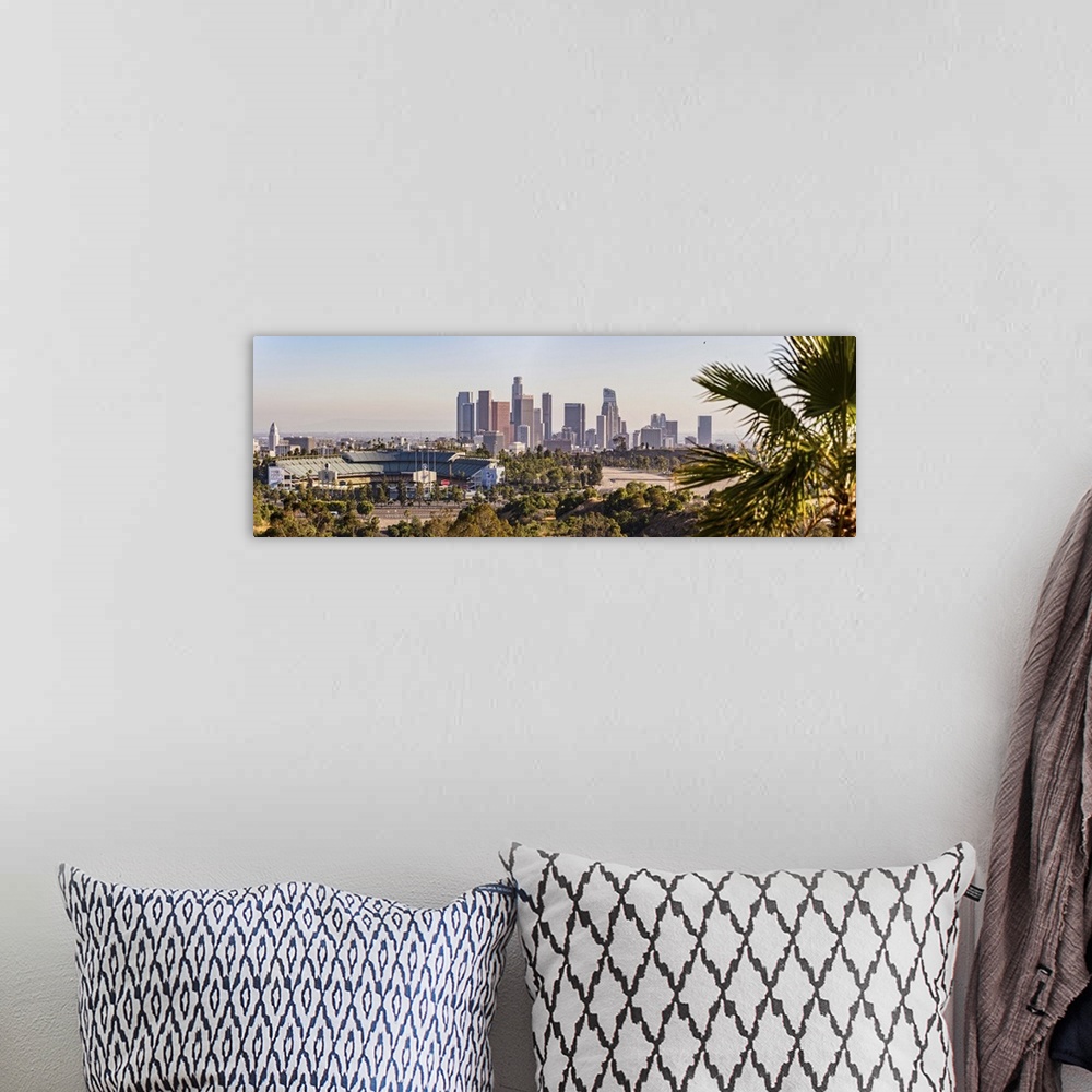 A bohemian room featuring Panoramic photograph of the downtown Los Angeles skyline with Dodger Stadium on the left and a pa...