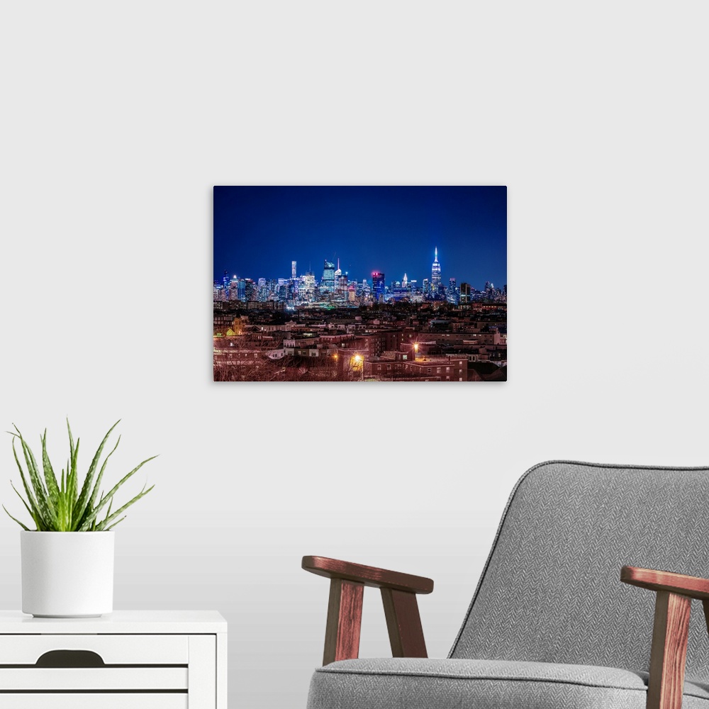 A modern room featuring View of downtown New York from the west side over the Hudson River.