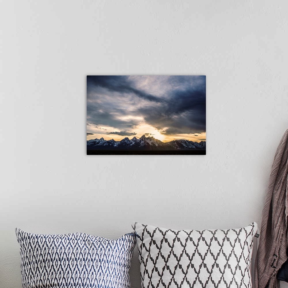 A bohemian room featuring View of dramatic clouds over Teton mountains in Wyoming.