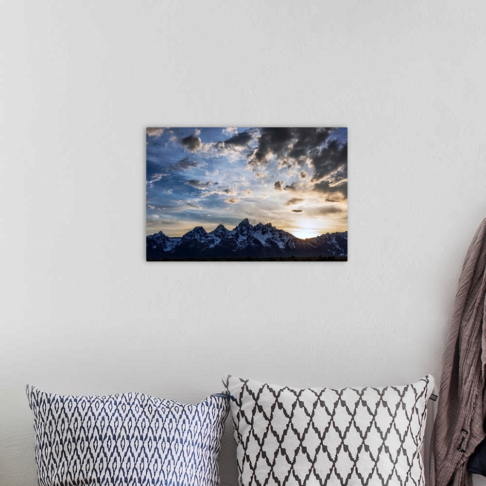 A bohemian room featuring View of dramatic clouds over Teton mountains in Wyoming.