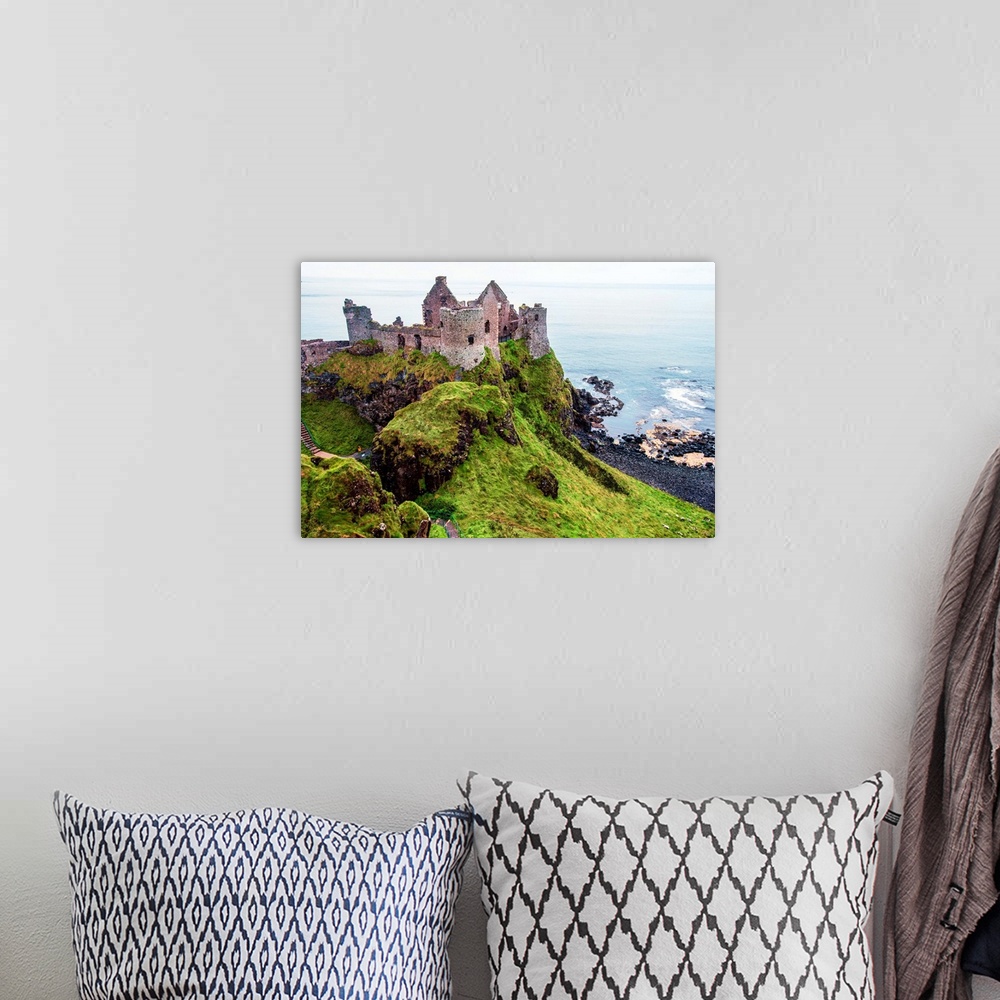 A bohemian room featuring View of now-ruined medieval castle in Northern Ireland.