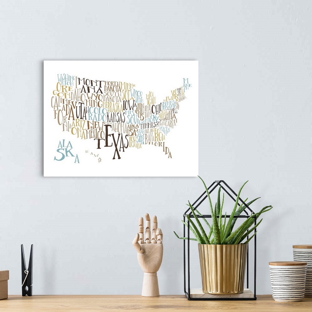 A bohemian room featuring A hand-drawn typography map of the United States with all the state names, in yellow and blue.
