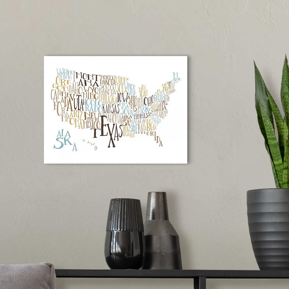 A modern room featuring A hand-drawn typography map of the United States with all the state names, in yellow and blue.