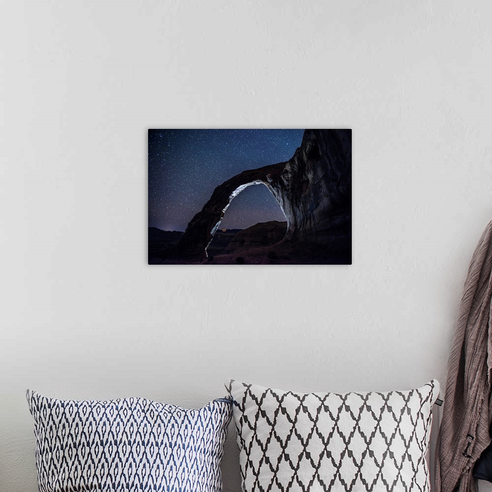 A bohemian room featuring View of the east side of Corona Arch, also known as Little Rainbow Bridge, near Arches National P...