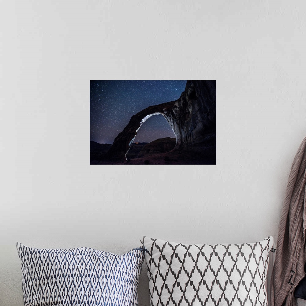 A bohemian room featuring View of the east side of Corona Arch, also known as Little Rainbow Bridge, near Arches National P...