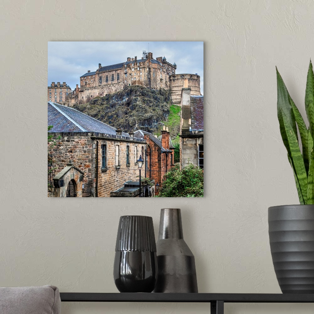 A modern room featuring Square photograph of the Edinburgh Castle with old stone buildings in the foreground, Edinburgh, ...