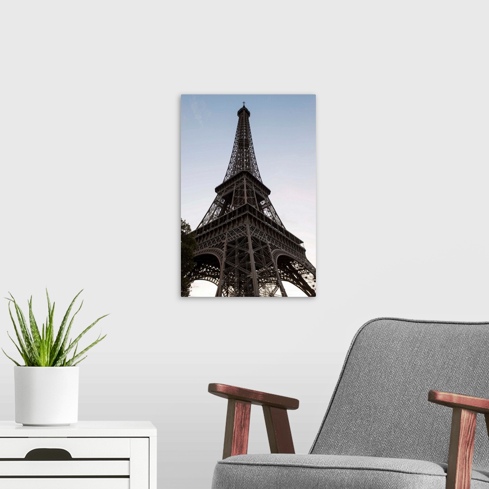 A modern room featuring Photograph looking up at the Eiffel Tower, Paris