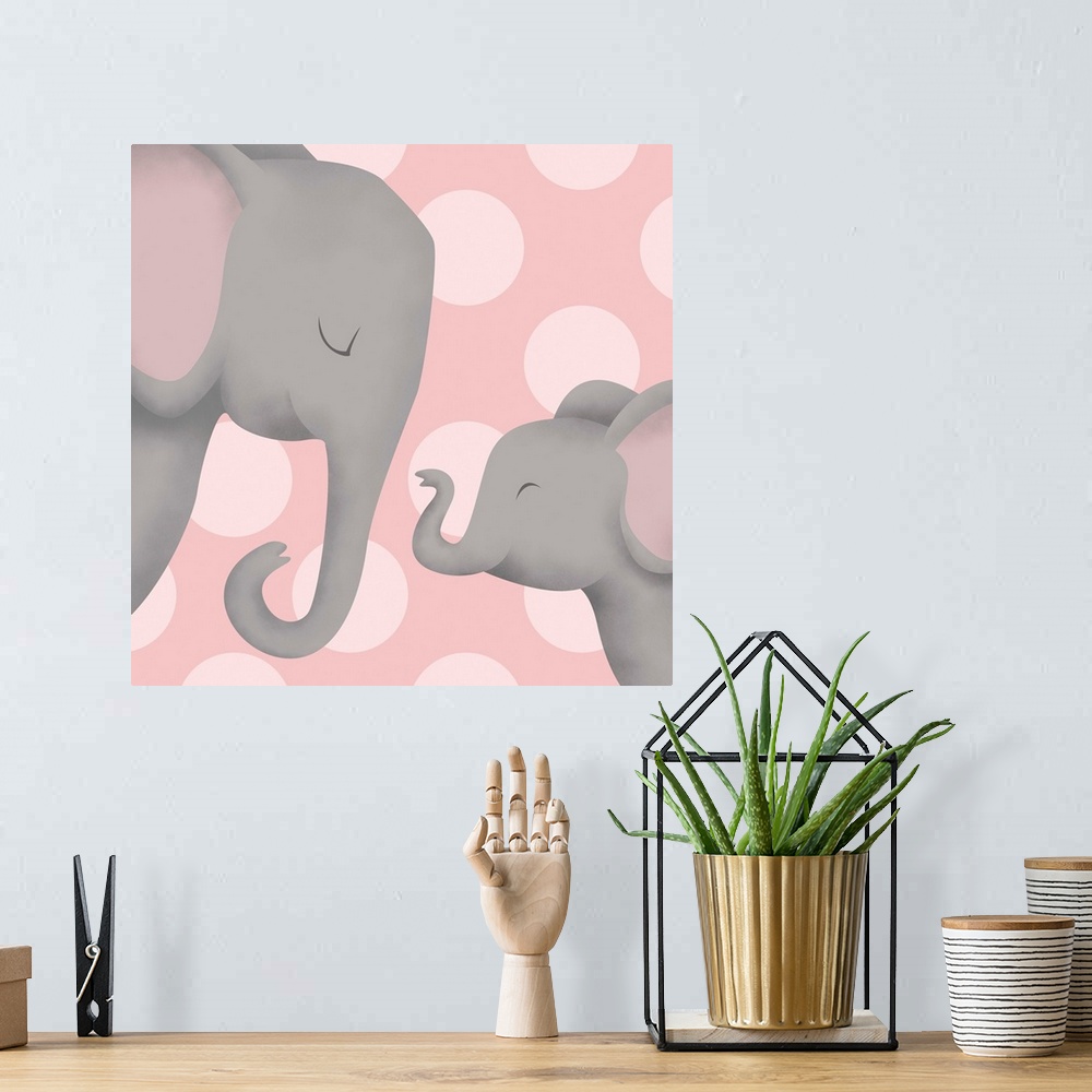 A bohemian room featuring Nursery art of a mother elephant and her baby on a pink polka-dot background.
