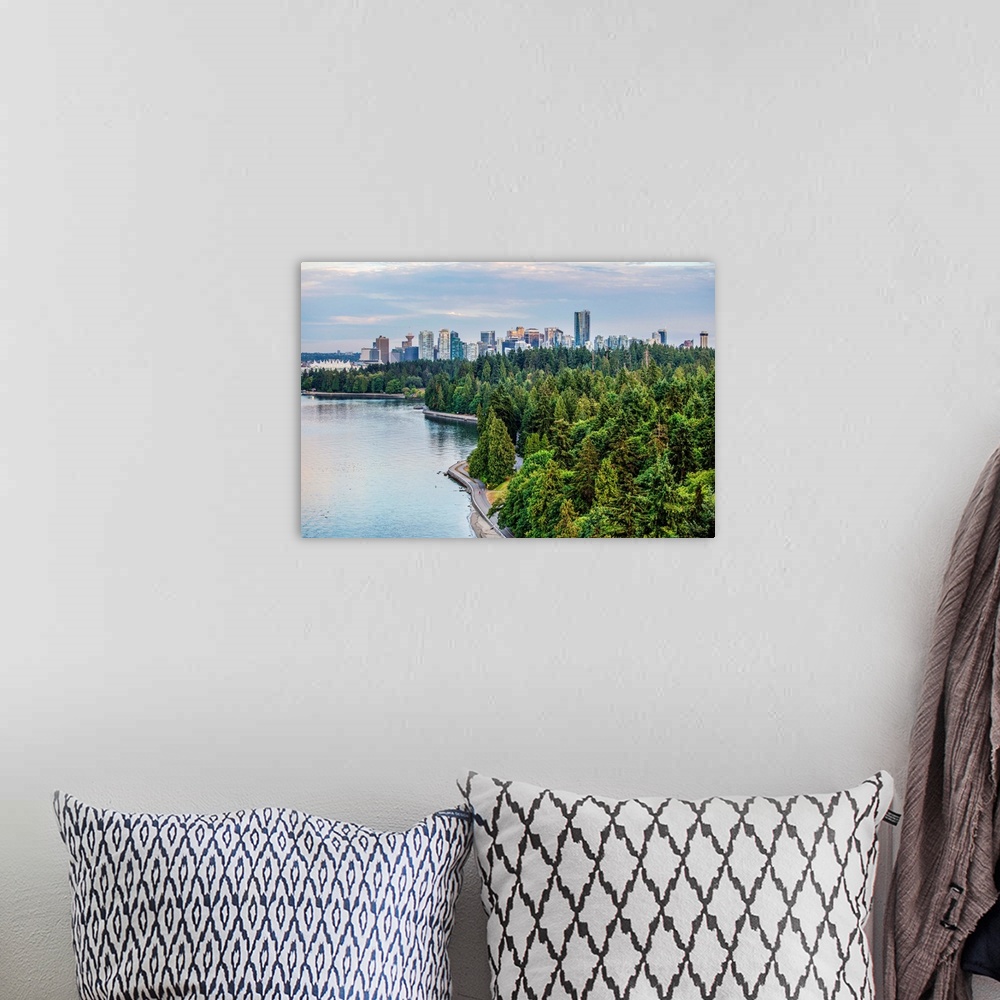 A bohemian room featuring Elevated view of downtown Vancouver and Stanley Park Seawall Path in British Columbia, Canada.