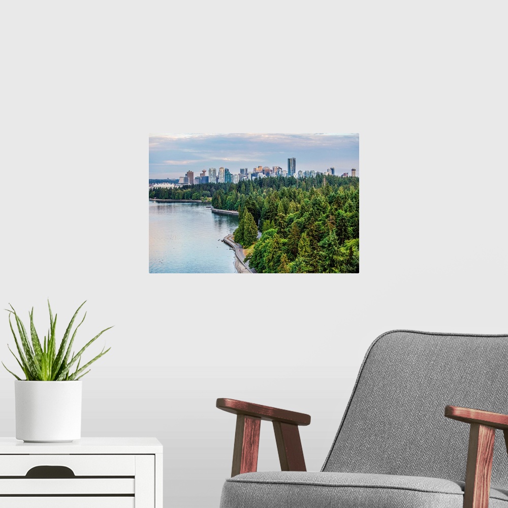 A modern room featuring Elevated view of downtown Vancouver and Stanley Park Seawall Path in British Columbia, Canada.