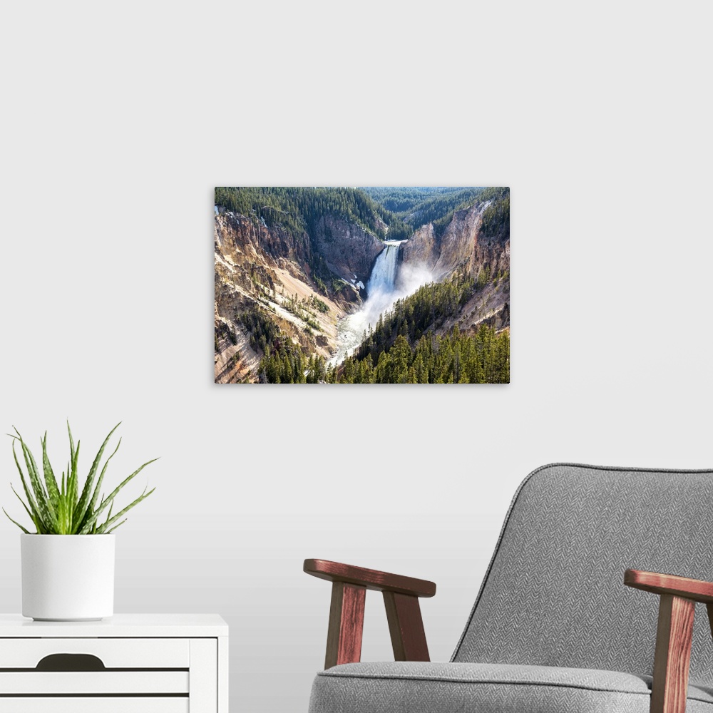 A modern room featuring Lower Yellowstone falls is one of two major waterfalls on the Yellowstone River.
