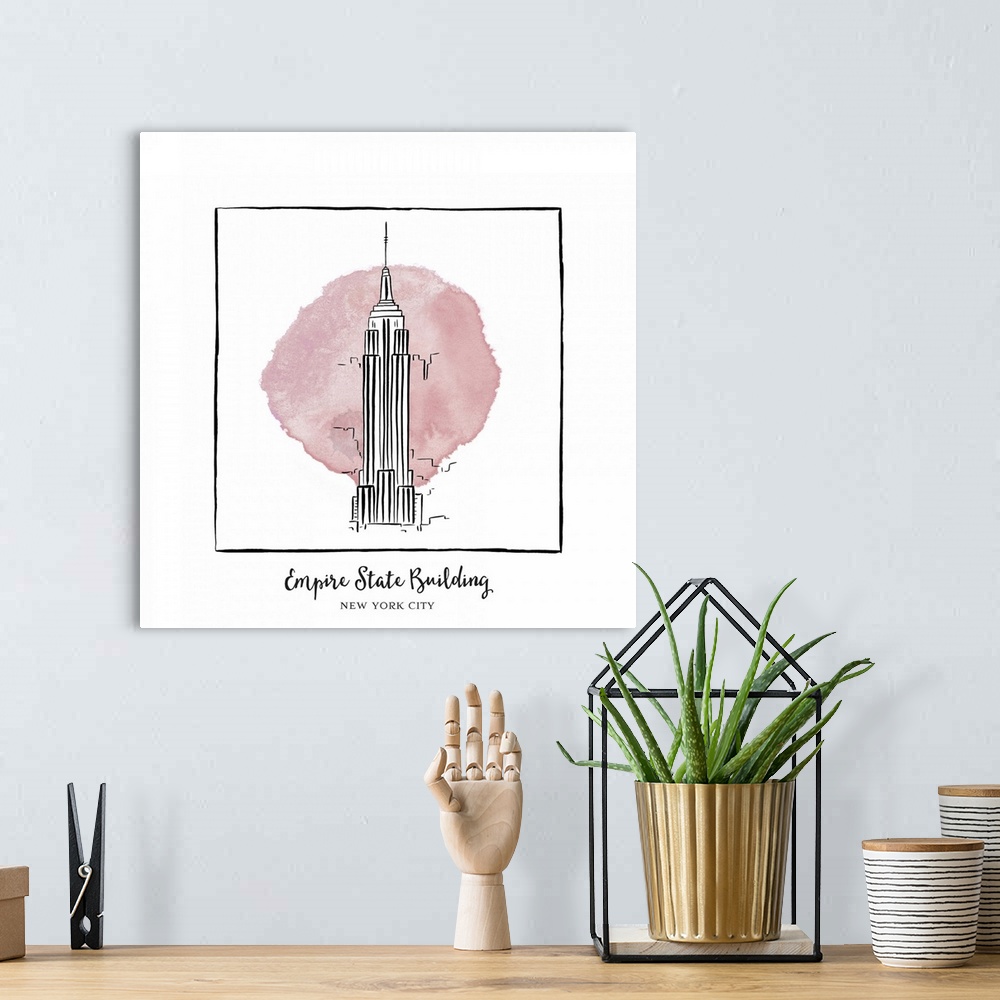 A bohemian room featuring An ink illustration of the Empire State Building in New York City, with a pink watercolor wash.