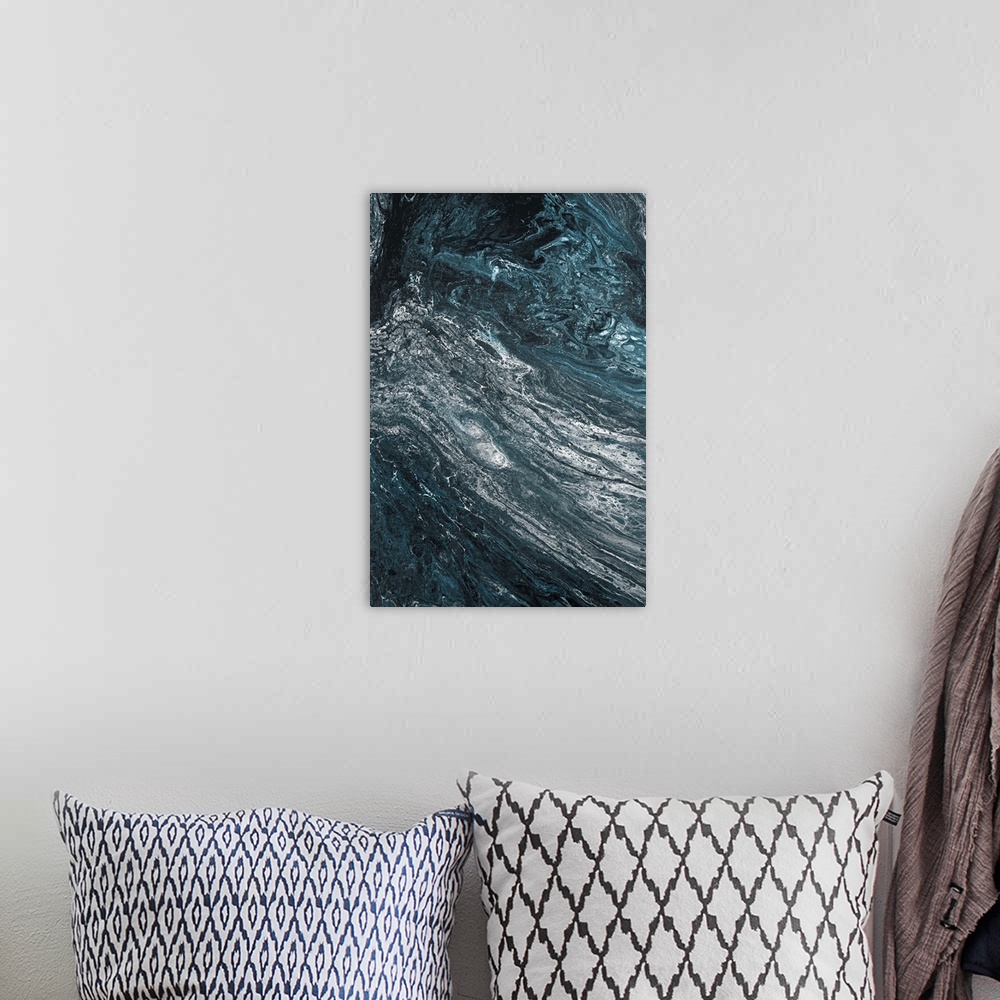 A bohemian room featuring Abstract contemporary painting in black, white and blue tones, in a marbling effect.