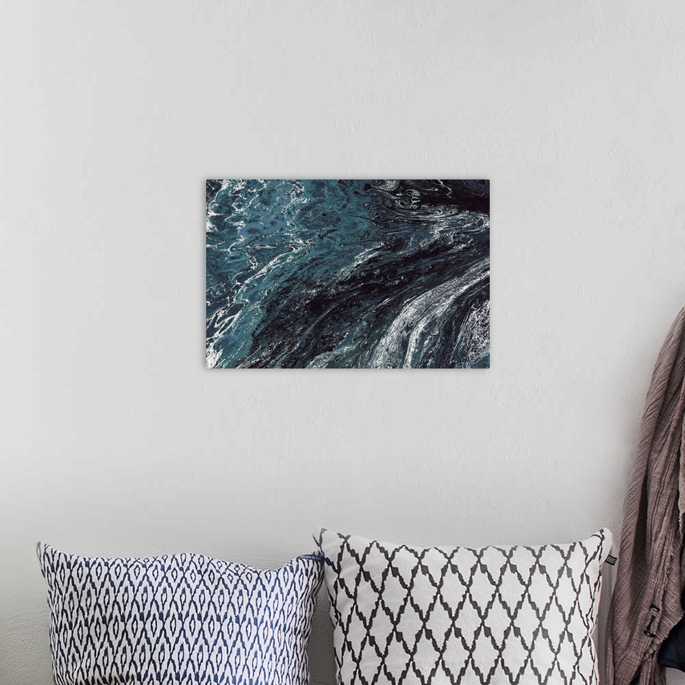 A bohemian room featuring Abstract contemporary painting in black, white and blue tones, in a marbling effect.