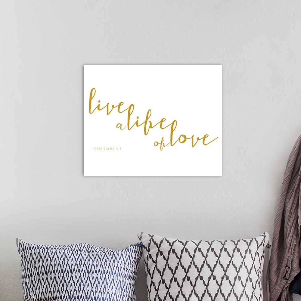 A bohemian room featuring Handlettered Bible verse reading Be patient; be gentle; be humble; be loving.