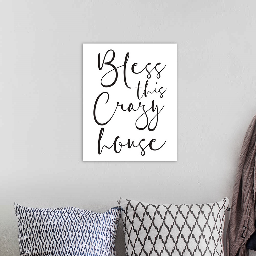 A bohemian room featuring A simple black and white typographical piece perfect for a family home.