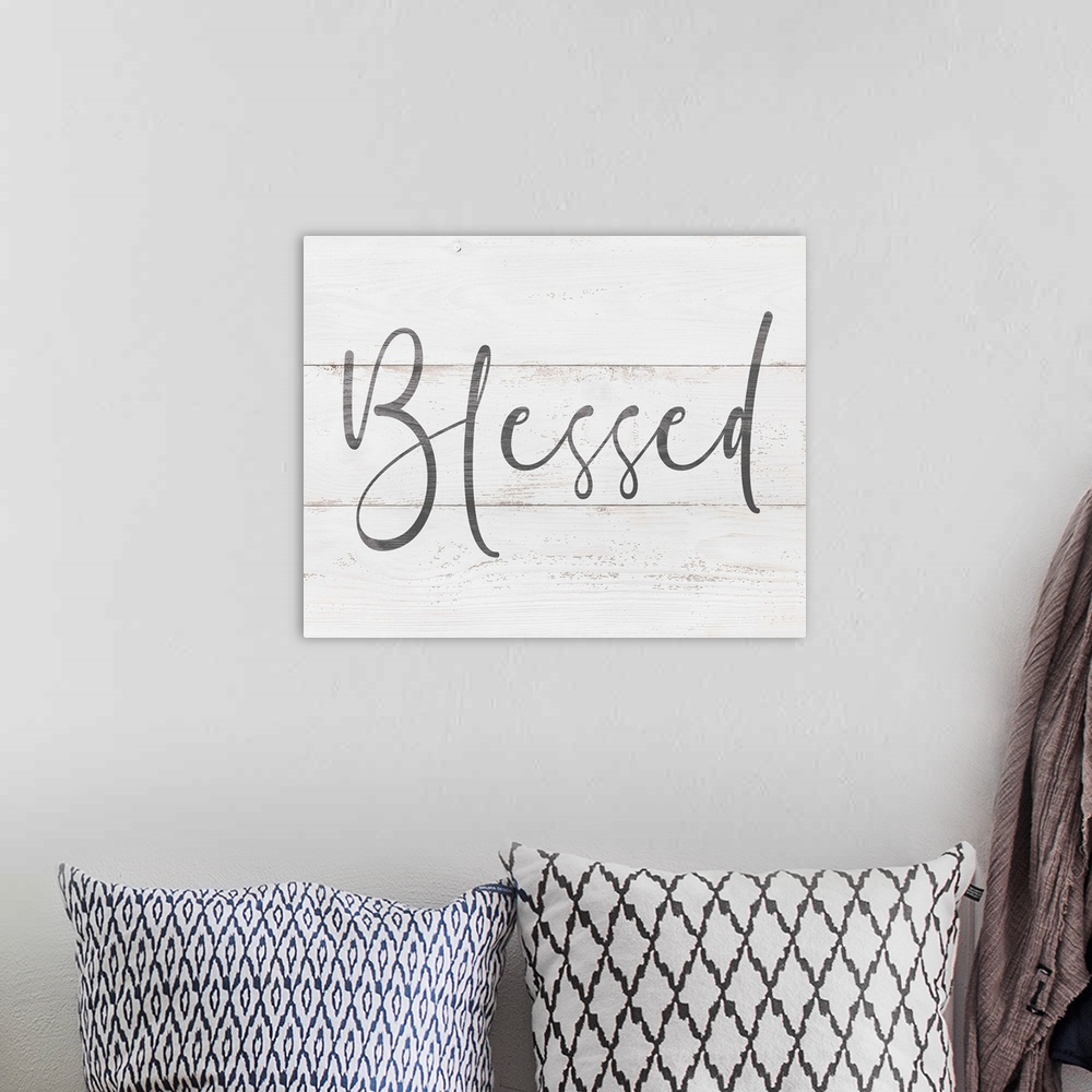 A bohemian room featuring A simple, single word sentiment in grey on a rustic white board background, perfect for a country...