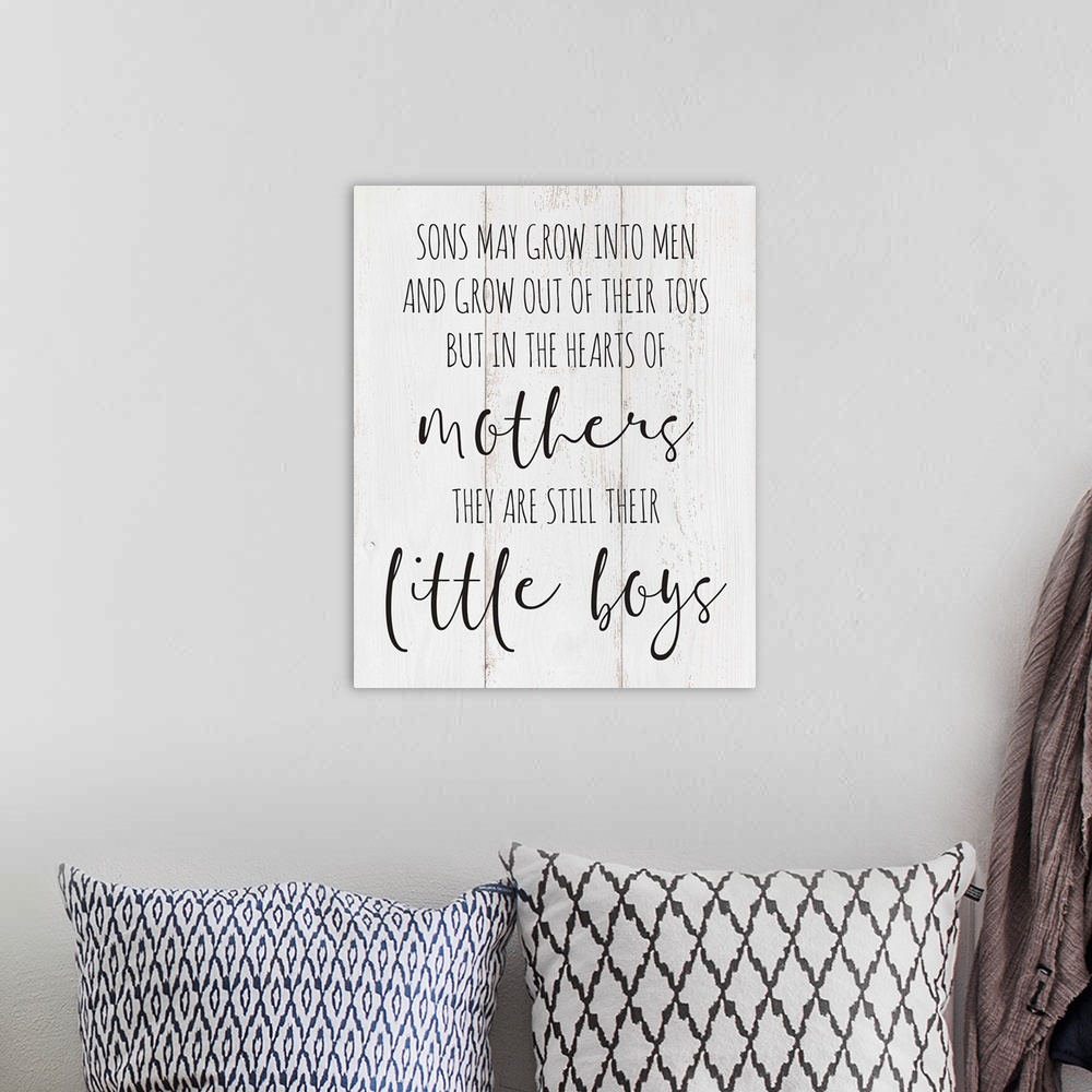 A bohemian room featuring A typography piece in farmhouse style depicting a sentimental bond between mothers and sons.