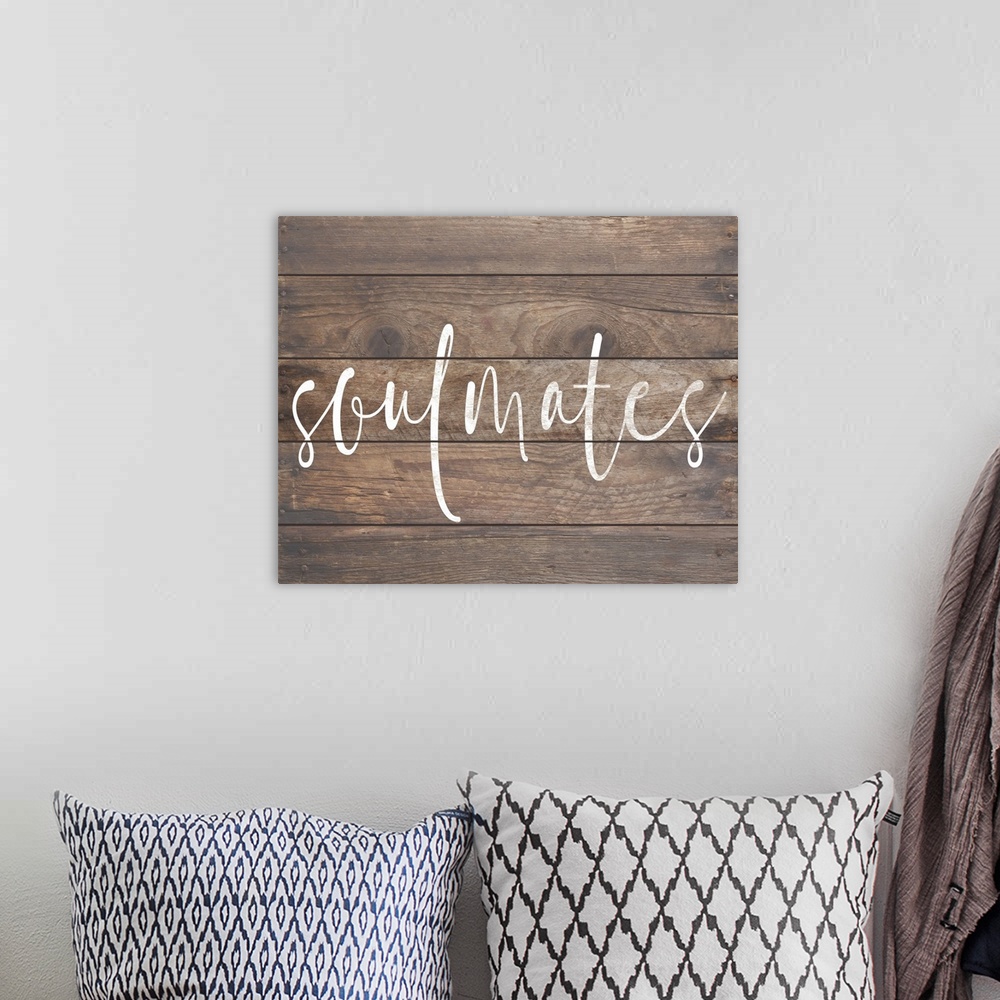 A bohemian room featuring A simple, single word sentiment in white on a rustic board background, perfect for a country or f...