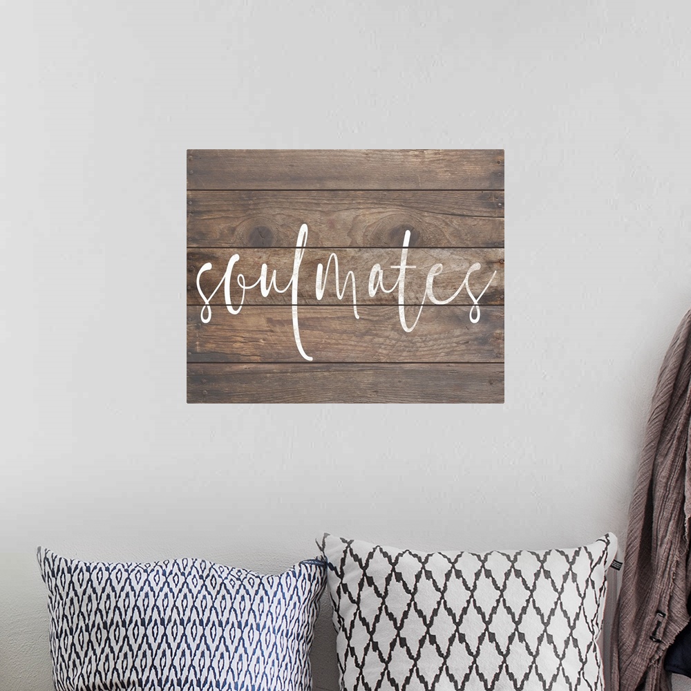 A bohemian room featuring A simple, single word sentiment in white on a rustic board background, perfect for a country or f...