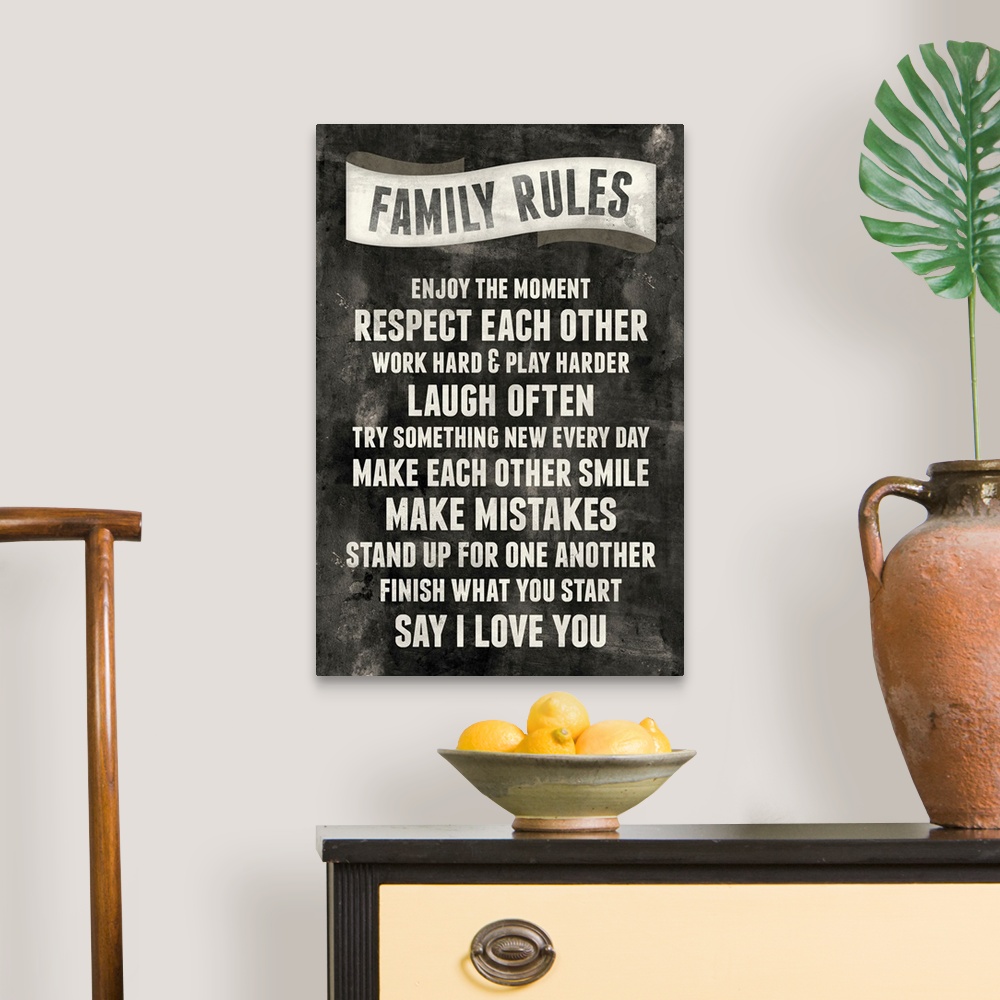 A traditional room featuring This large vertical print is titled "Family Rules" with a chalkboard type design. Rules are liste...