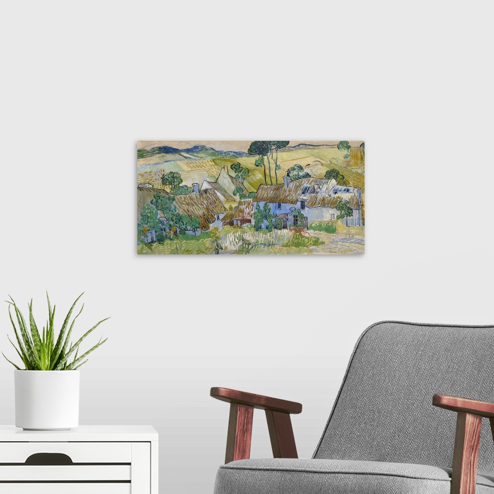 A modern room featuring Vincent van Gogh's Farms near Auvers (1890) famous landscape painting.