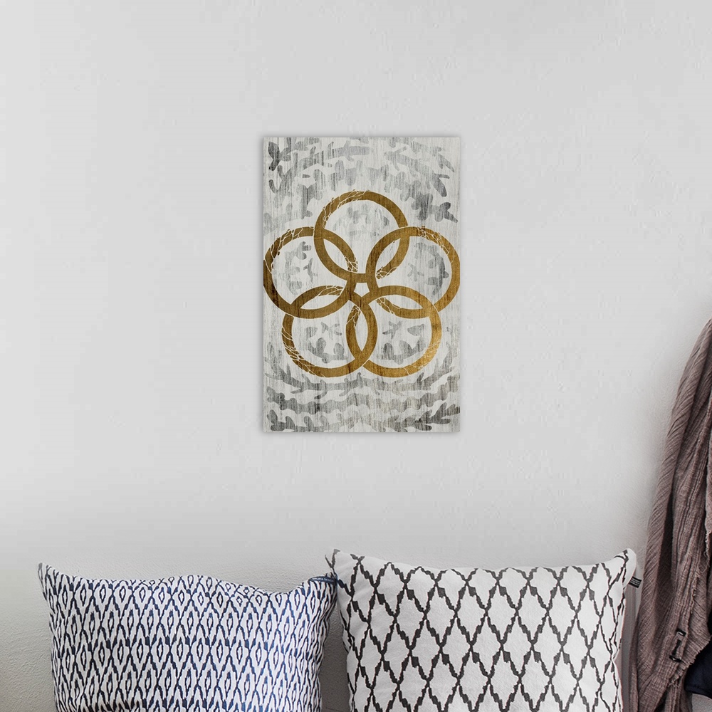A bohemian room featuring Gold leaf on weathered wood with a fern pattern of five gold rings.