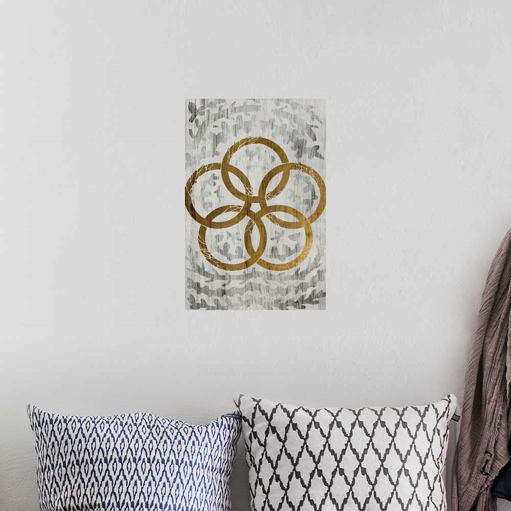 A bohemian room featuring Gold leaf on weathered wood with a fern pattern of five gold rings.
