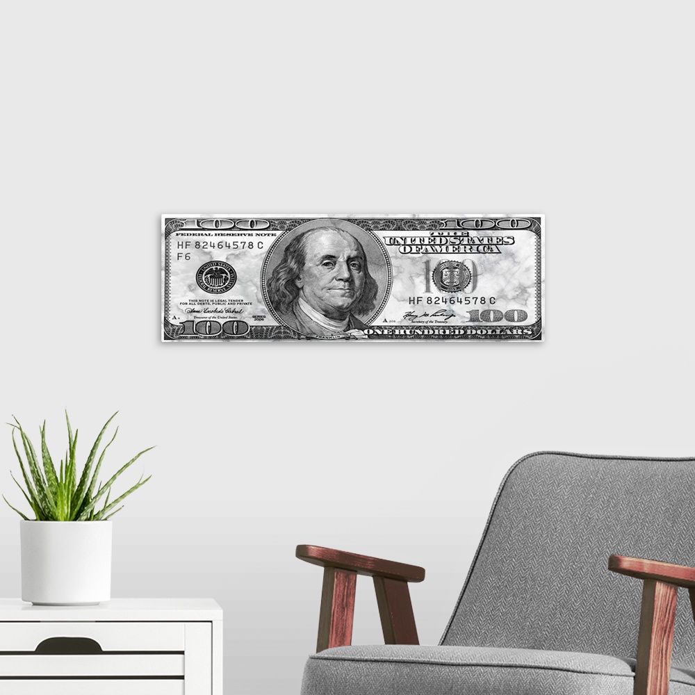 A modern room featuring The United States one hundred dollar bill in marble.