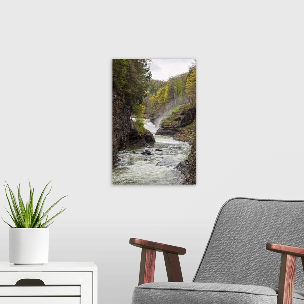 A modern room featuring Landscape photograph of the Genesee River rushing through Letchworth State Park with a waterfall ...
