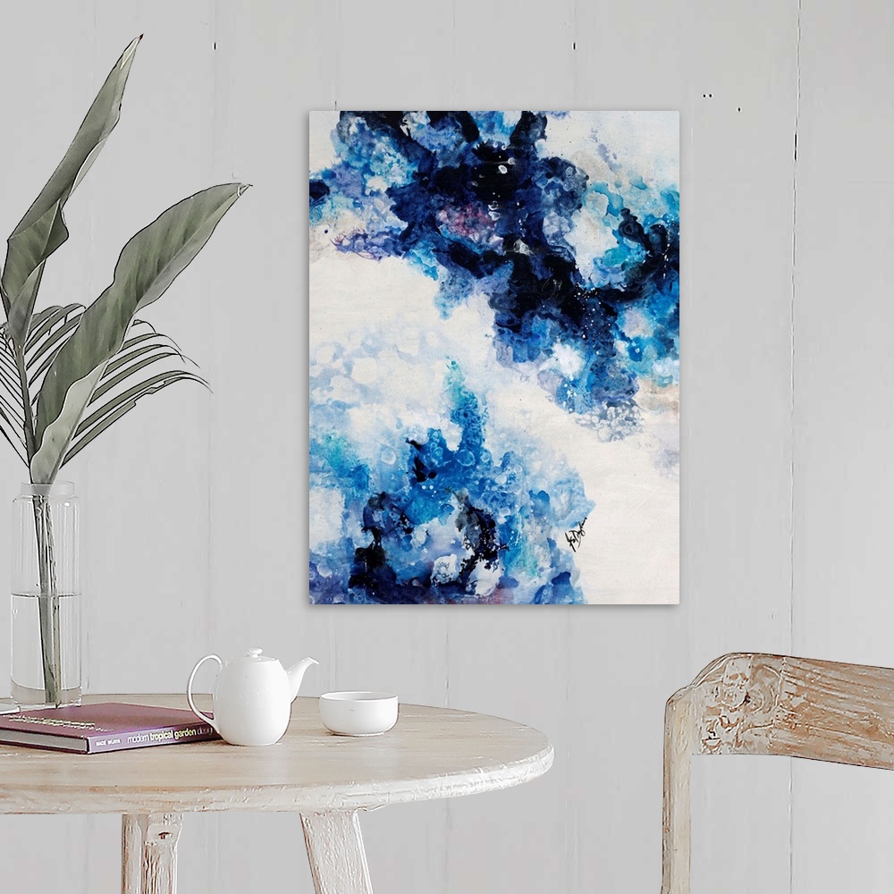 A farmhouse room featuring Abstract painting of a mixture of varying blue tones swirling around against a neutral background.
