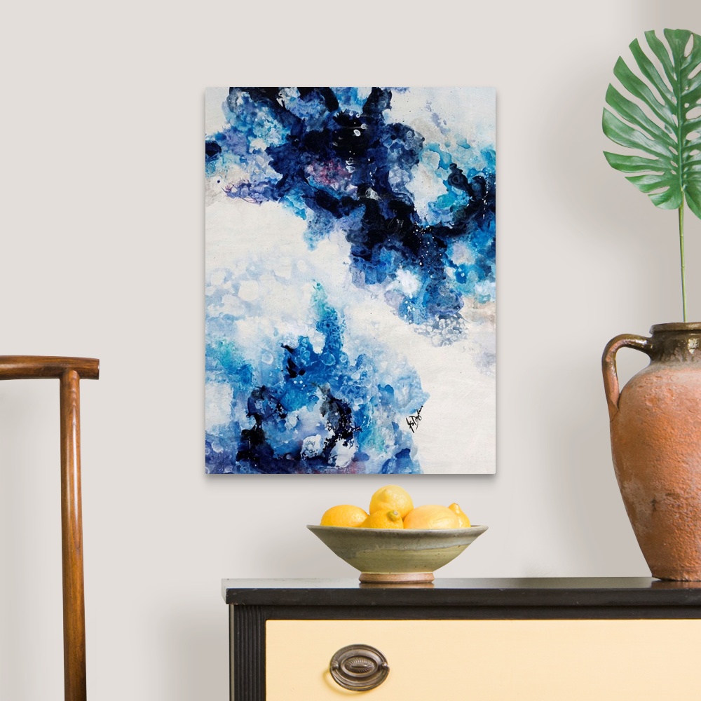 A traditional room featuring Abstract painting of a mixture of varying blue tones swirling around against a neutral background.